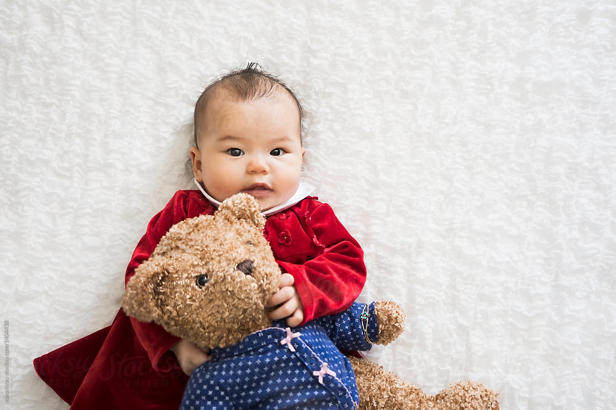 Asian baby girl with Teddy Bear