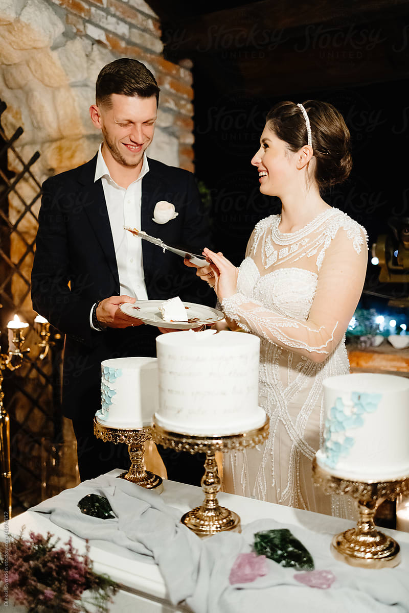 Newlyweds wedding cake ceremony