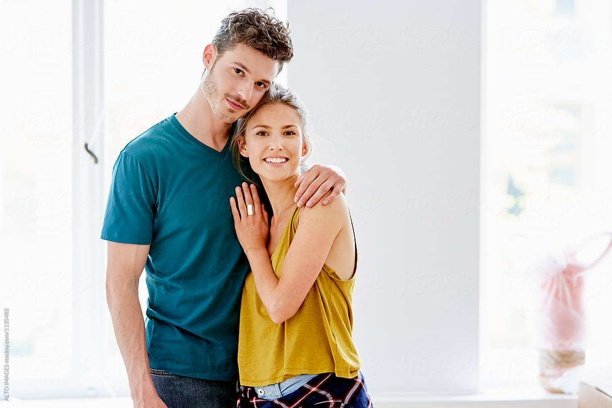 Loving Couple Standing Arm Around At Home By Alto Images Couple Loving Stocksy United