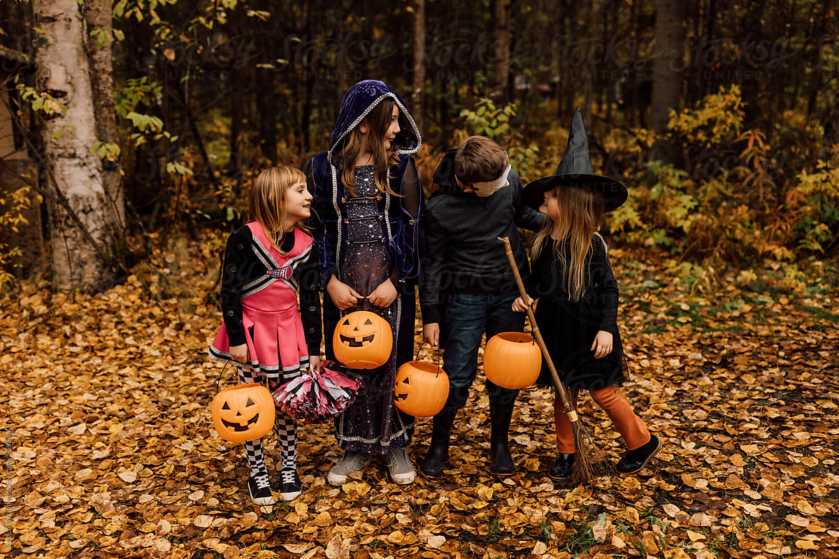 Kids Trick or Treating In Halloween Costumes