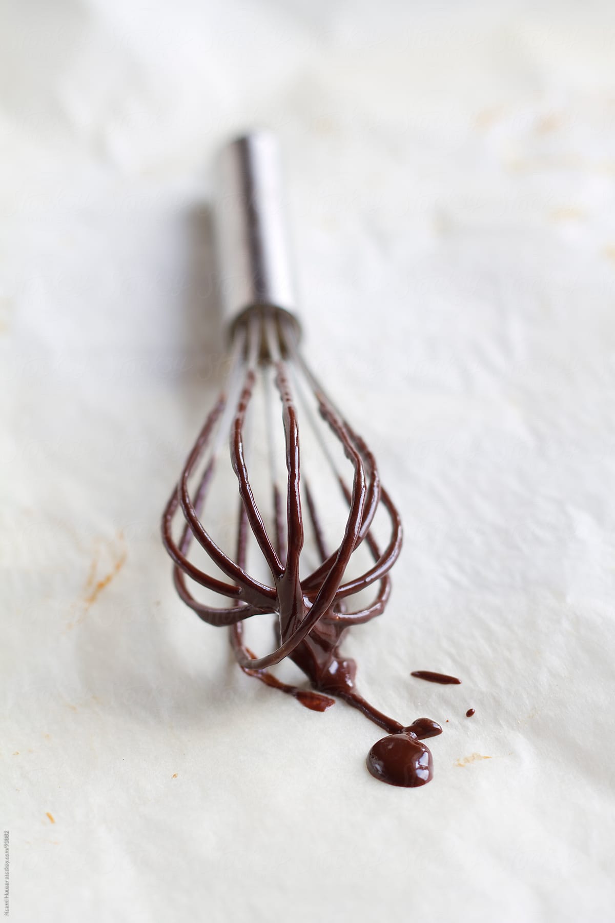 Whisk with molten chocolate
