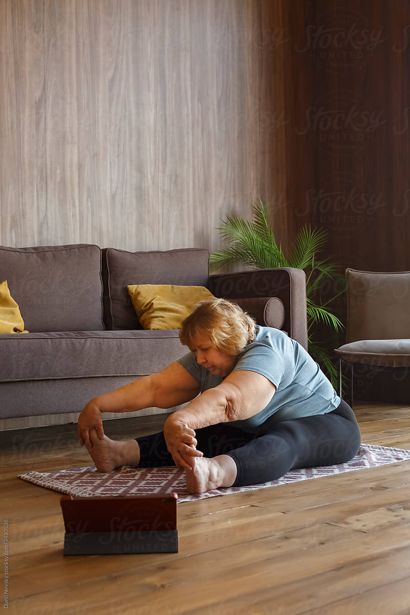 woman doing Seated Forward Bend