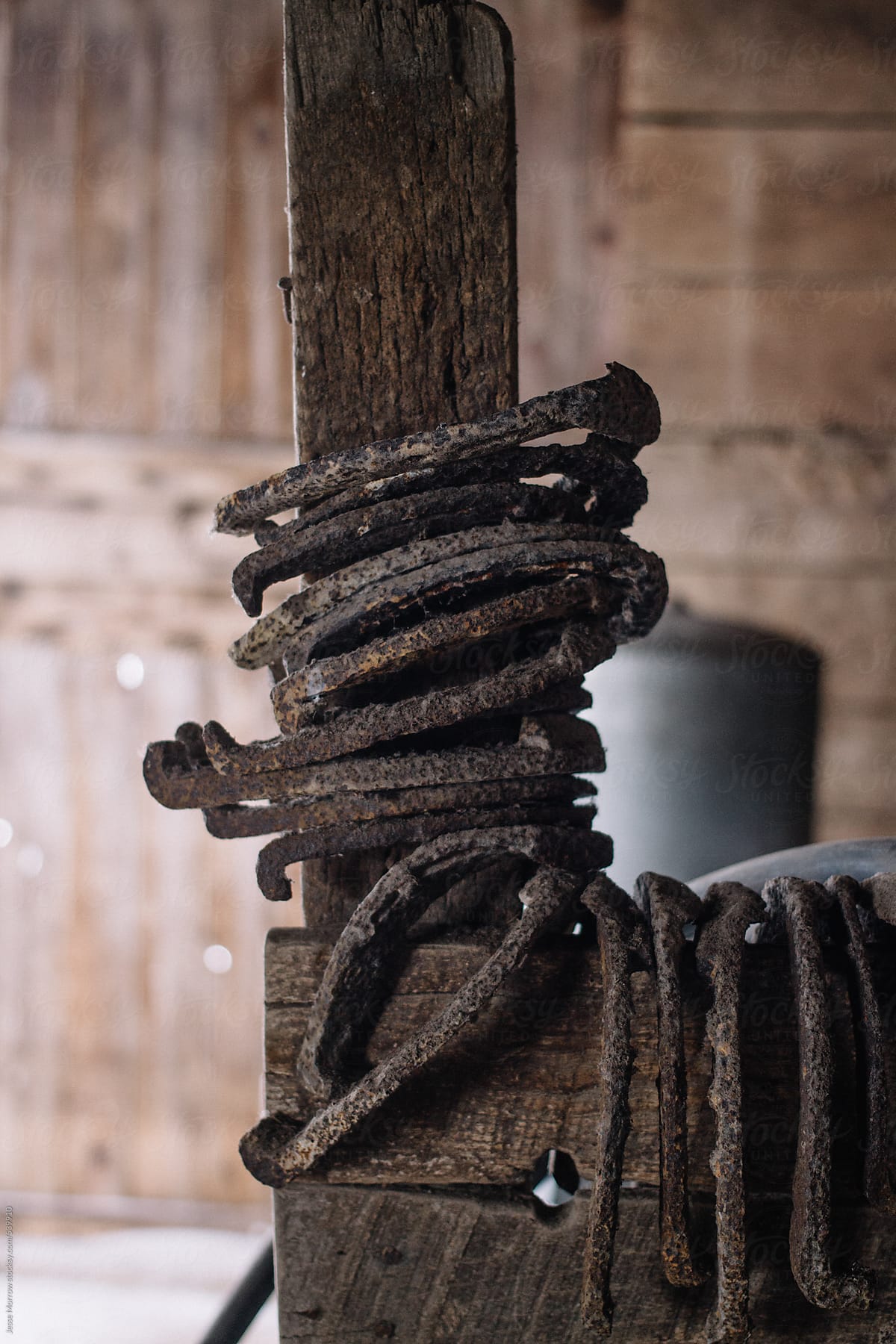 old rope and horse shoes in barn