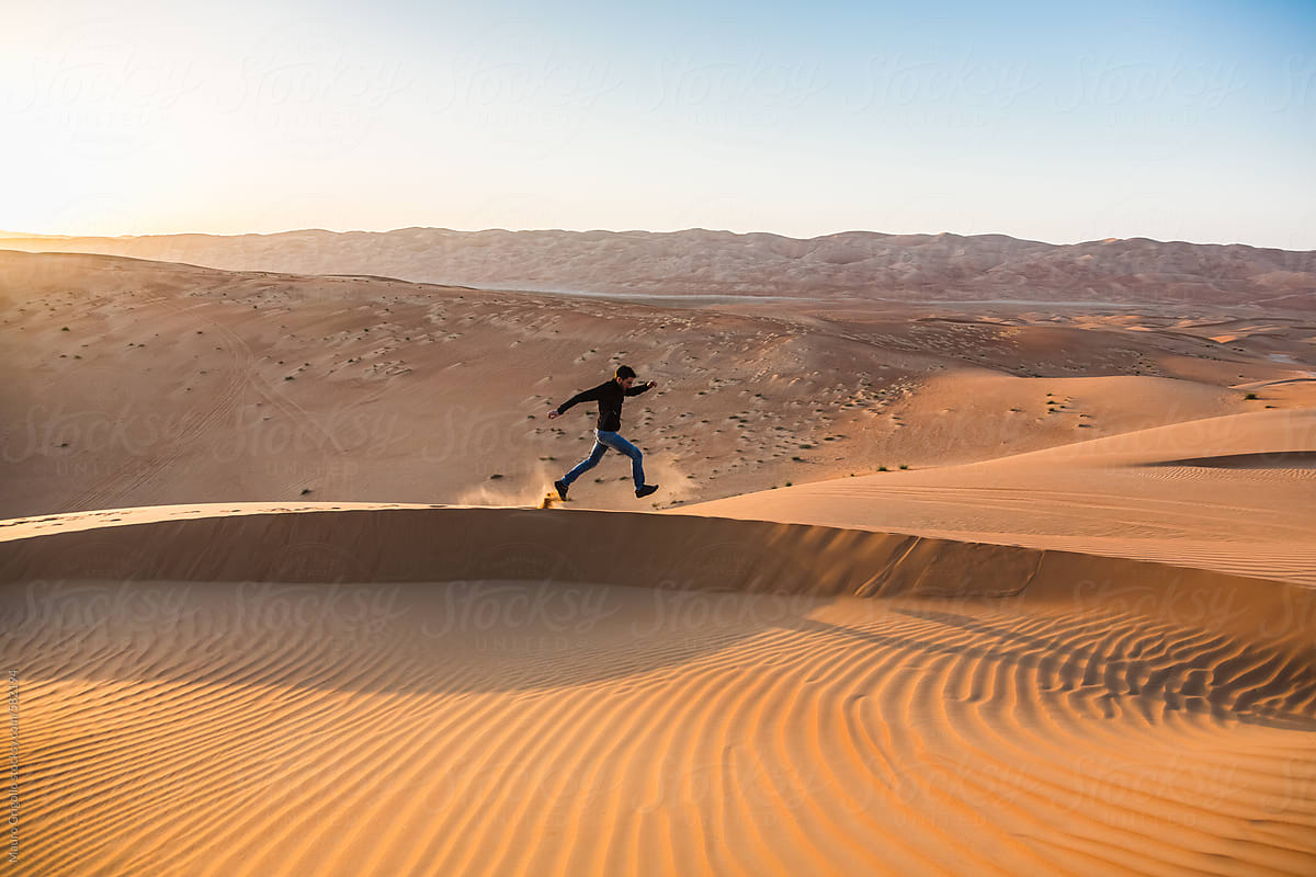 Man running alone in the desert