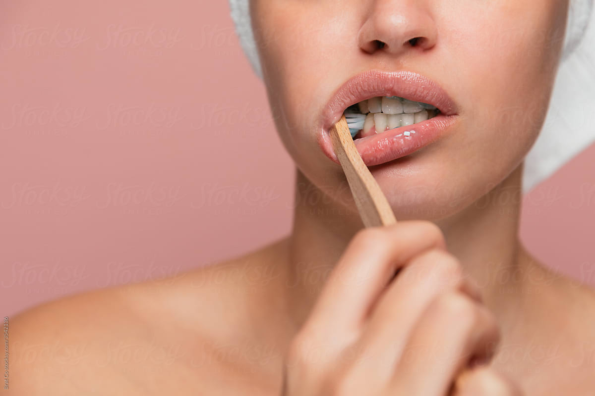 Woman Brushing Her Teeth