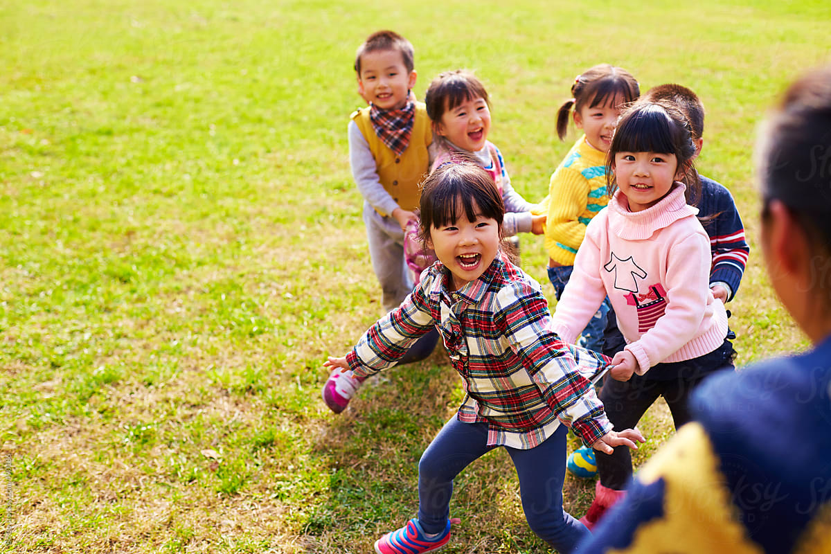 Happy Asian Kids Playing Outdoor In The Park by Bo Bo - Childhood, Lifestyle