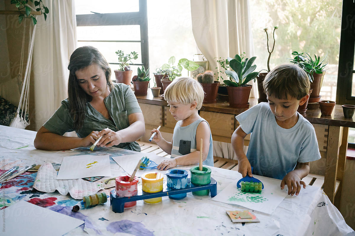 Mom painting with her sons