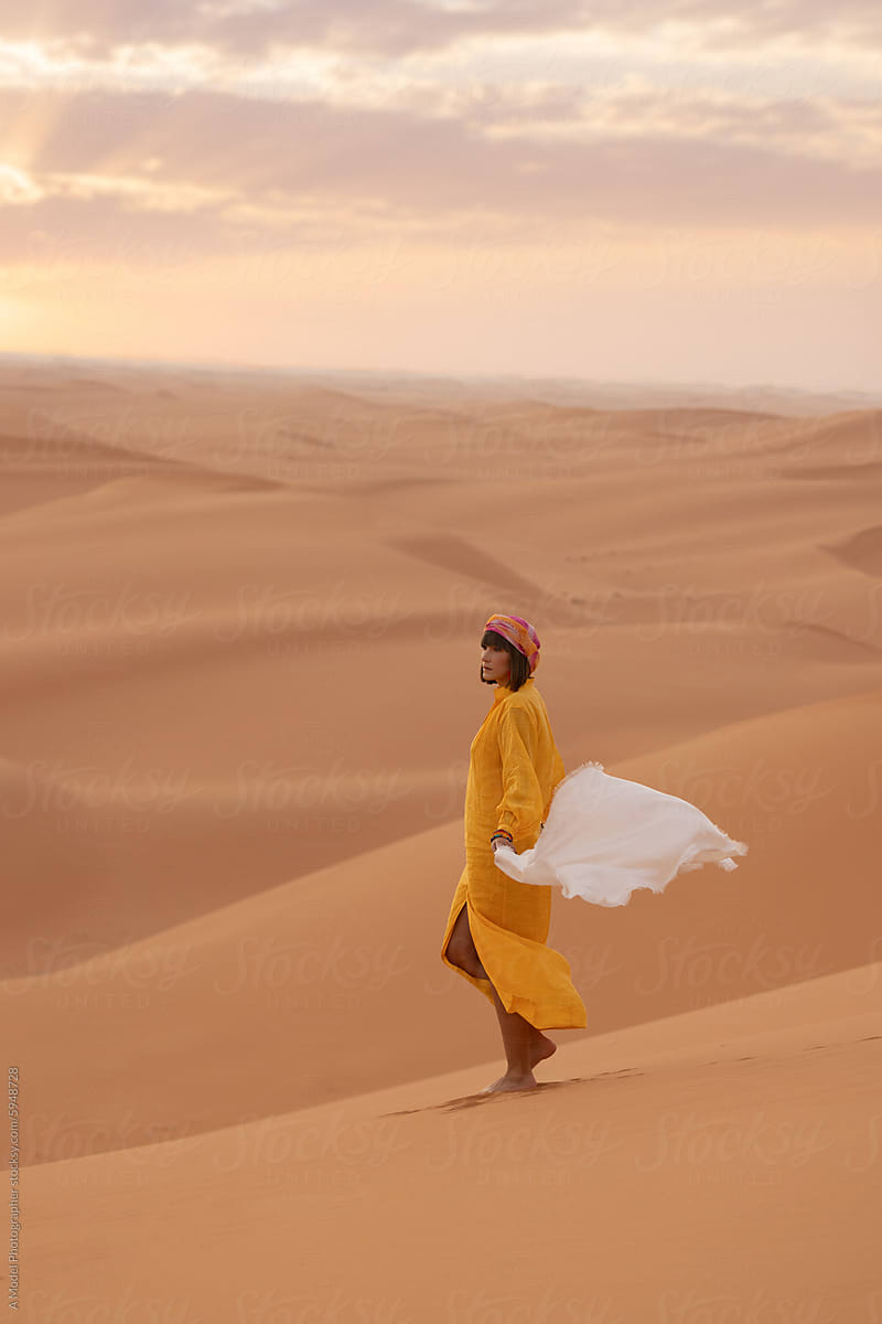 Amazing scene with a woman in the desert