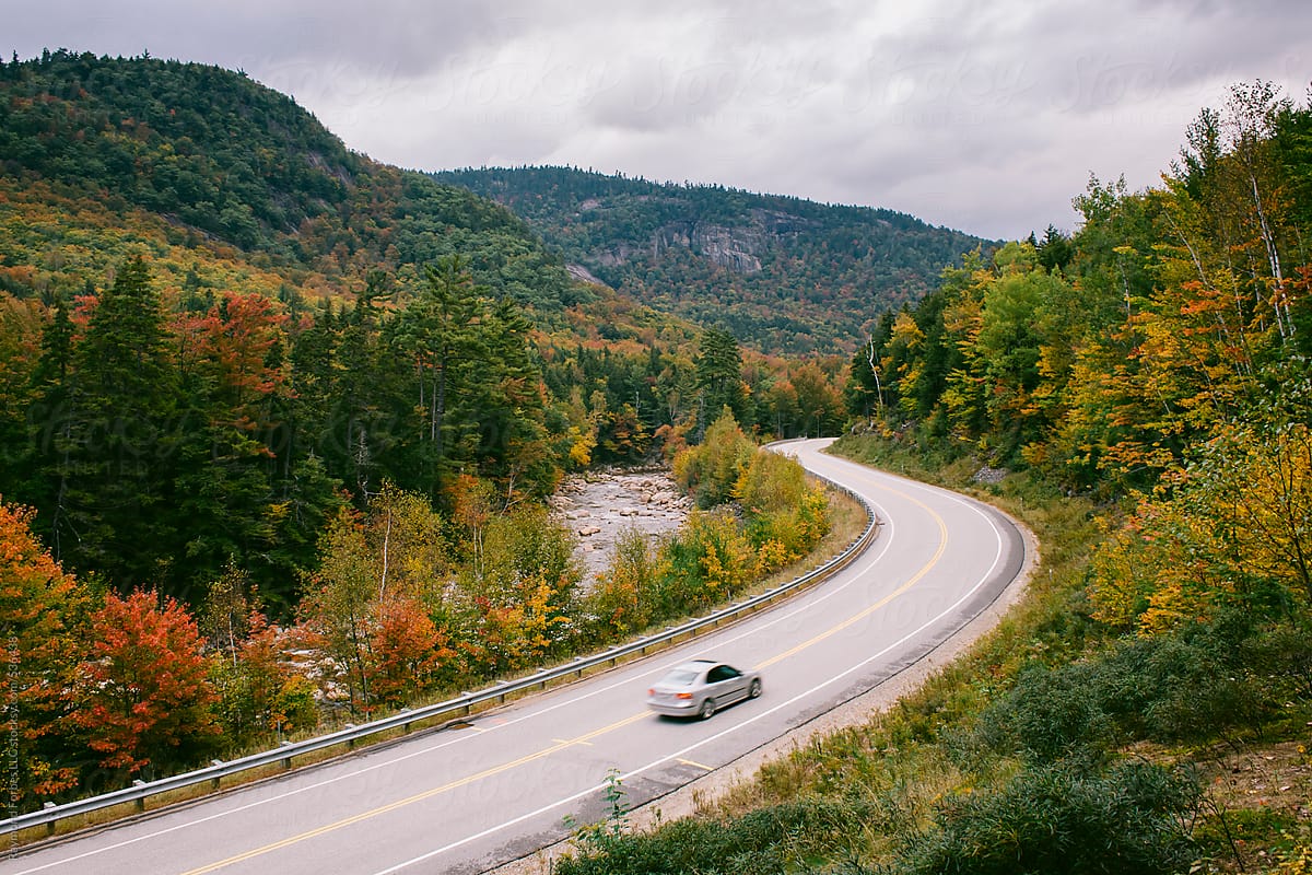 Car on Winding Road on Kankamagus Highway New Hampshire