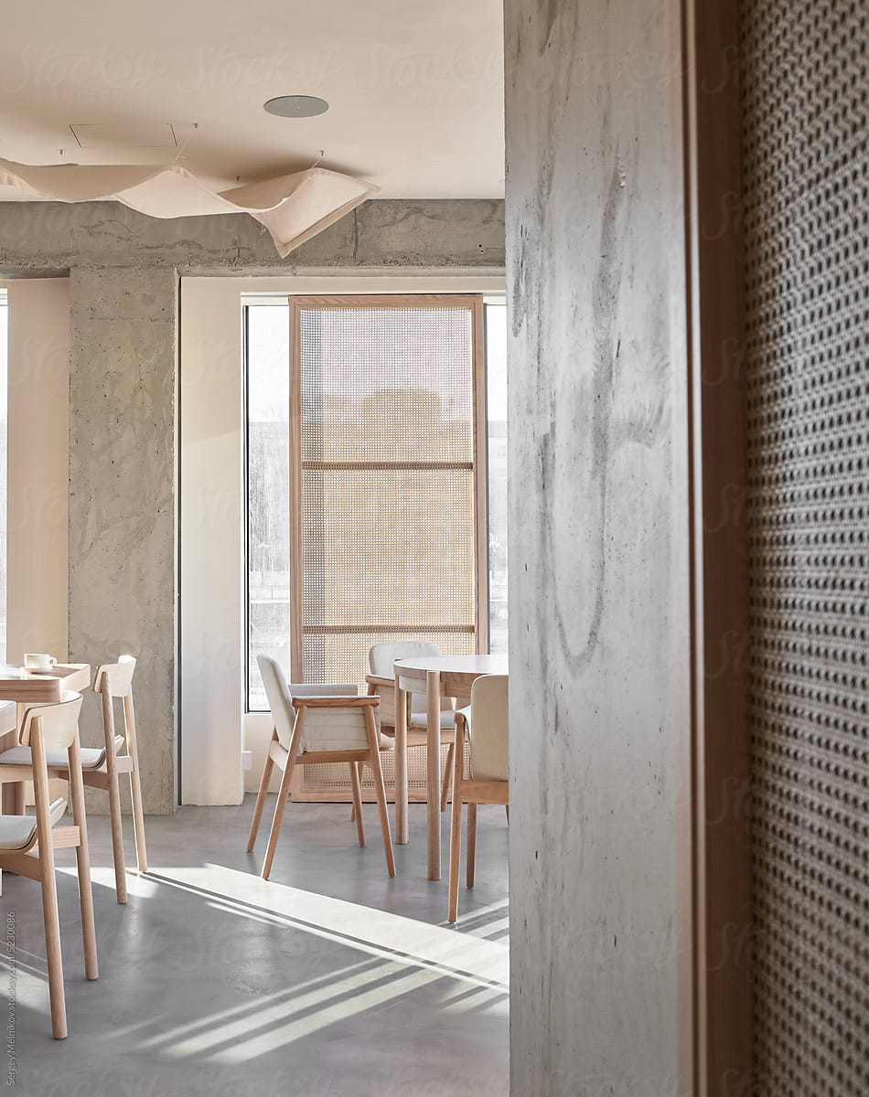 Minimalist restaurant interior with wooden furniture