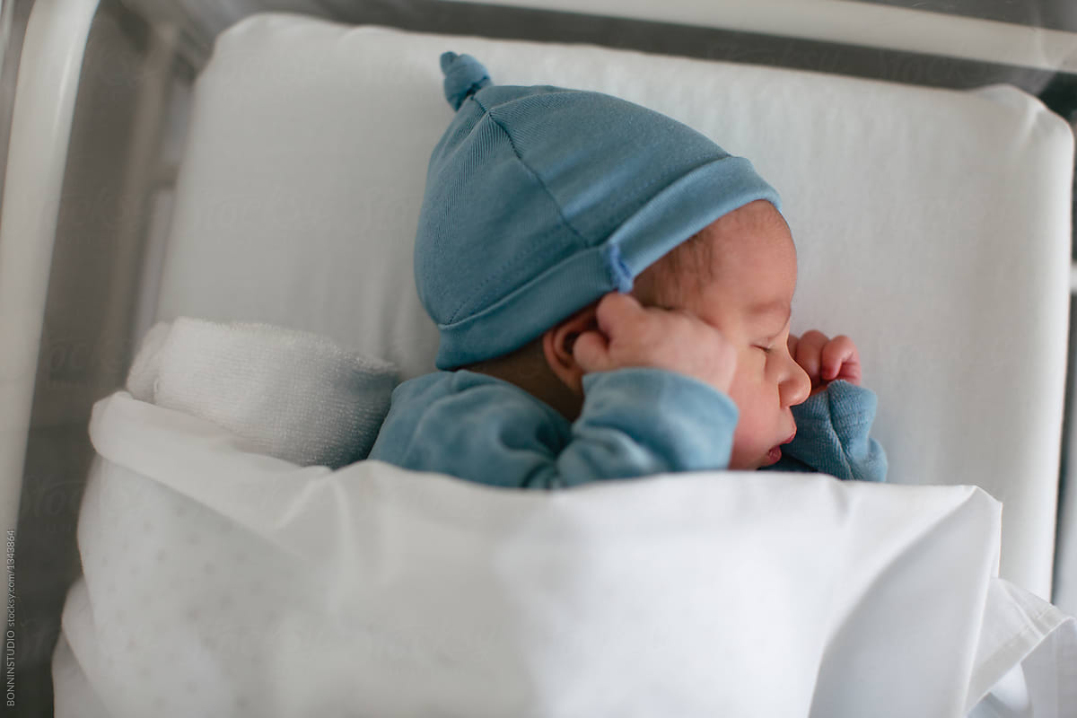 Newborn Baby Boy Sleeping In A Hospital Room By Stocksy Contributor