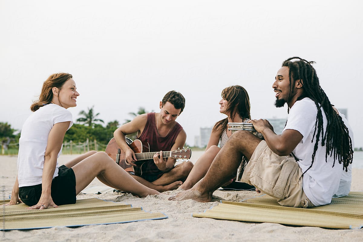 Friends Making Music at the Beach