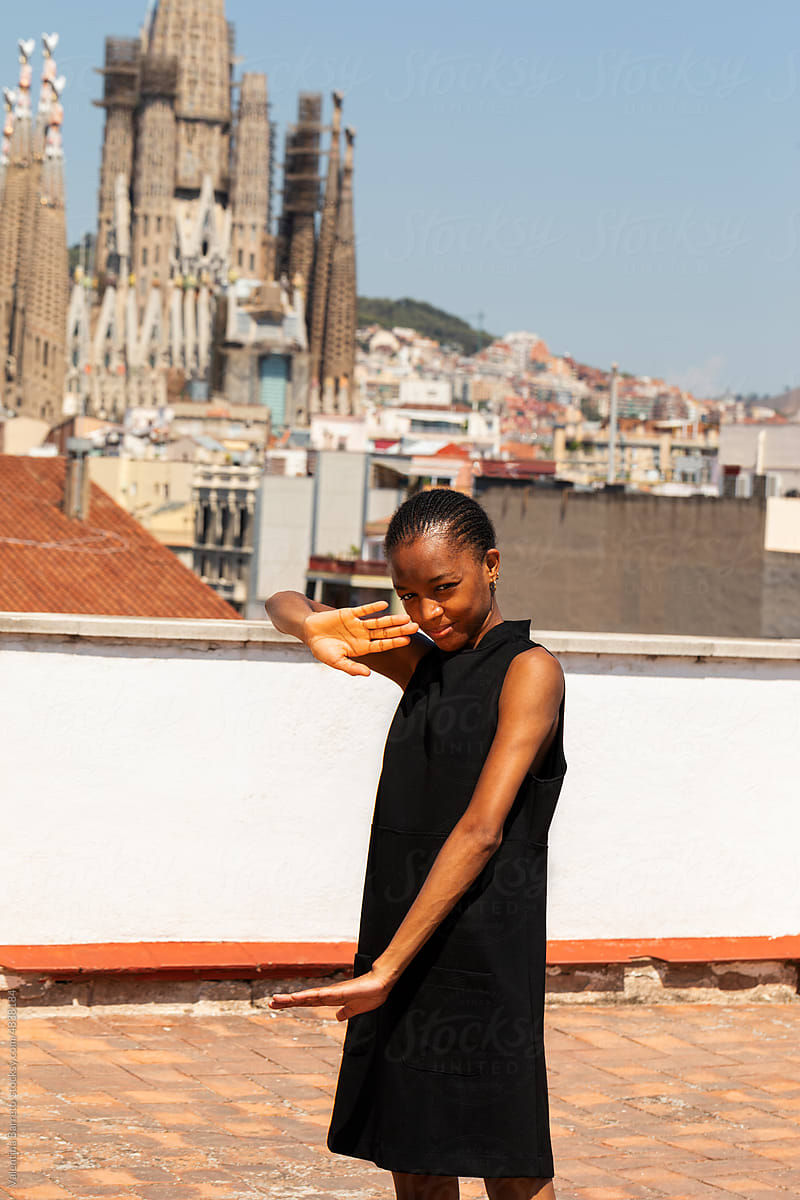 Black woman posing at rooftop