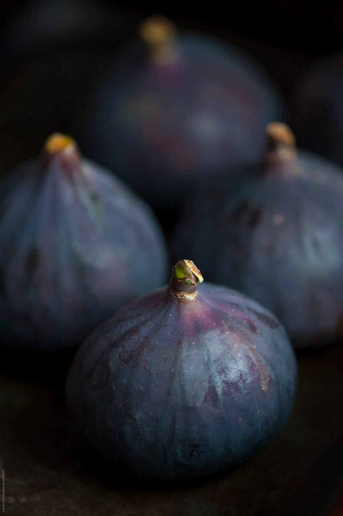 fresh ripe purple figs arranged for baking