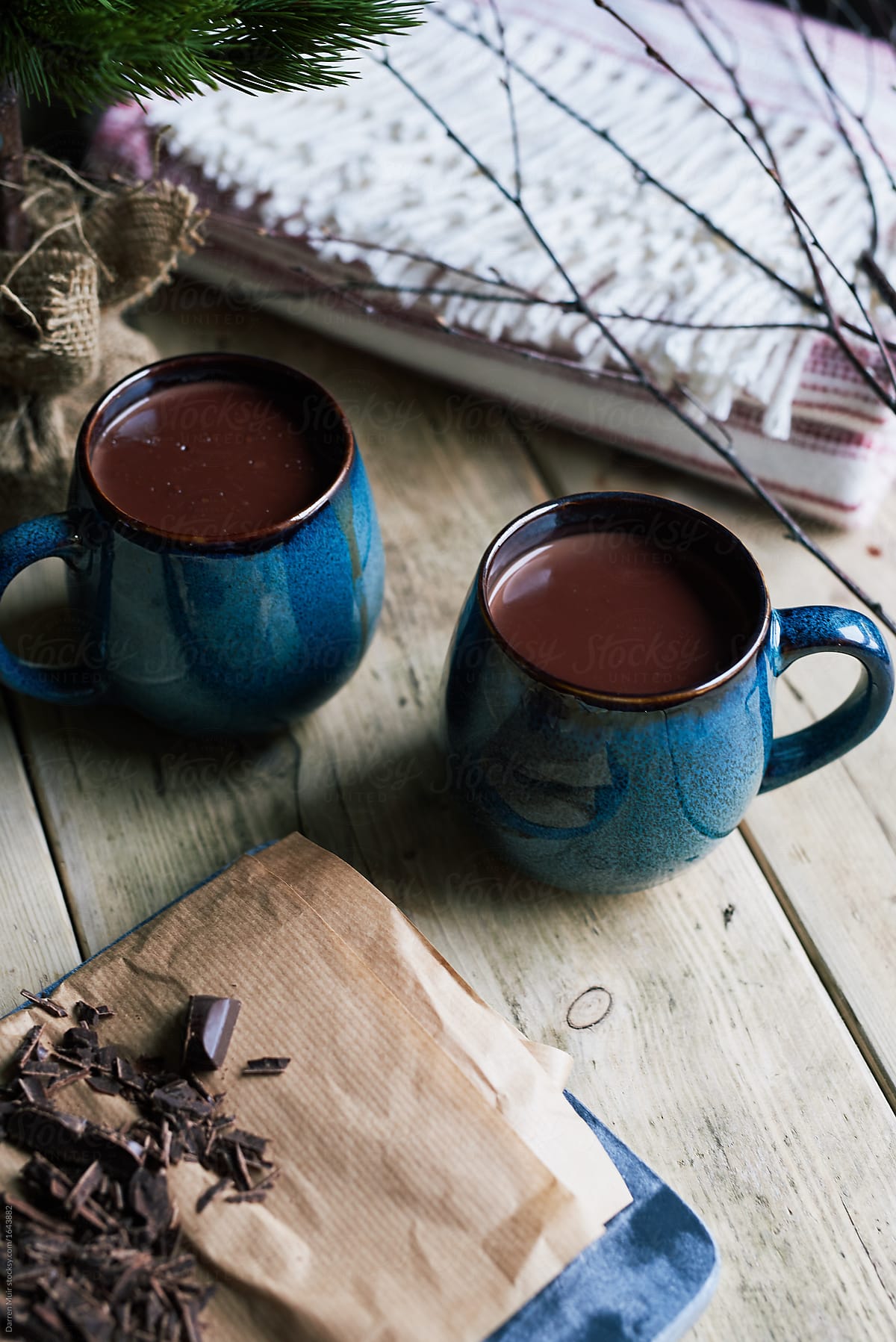 Hot chocolate drink on wooden table.