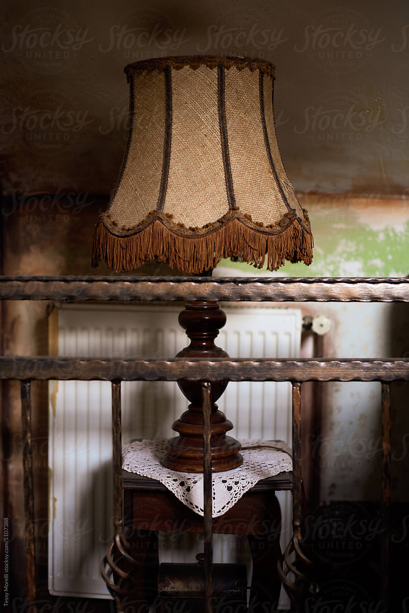 Interior decor still of retro lamp on wooden stool