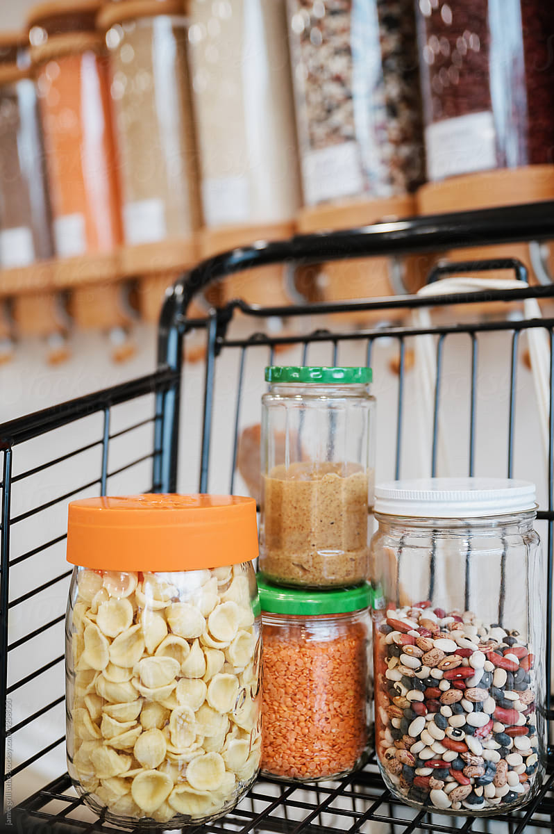 Reusable Glass Jars of Food in a Shopping Cart