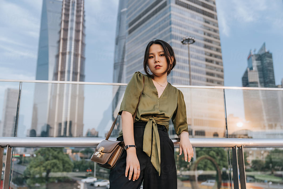 Asian woman with city background