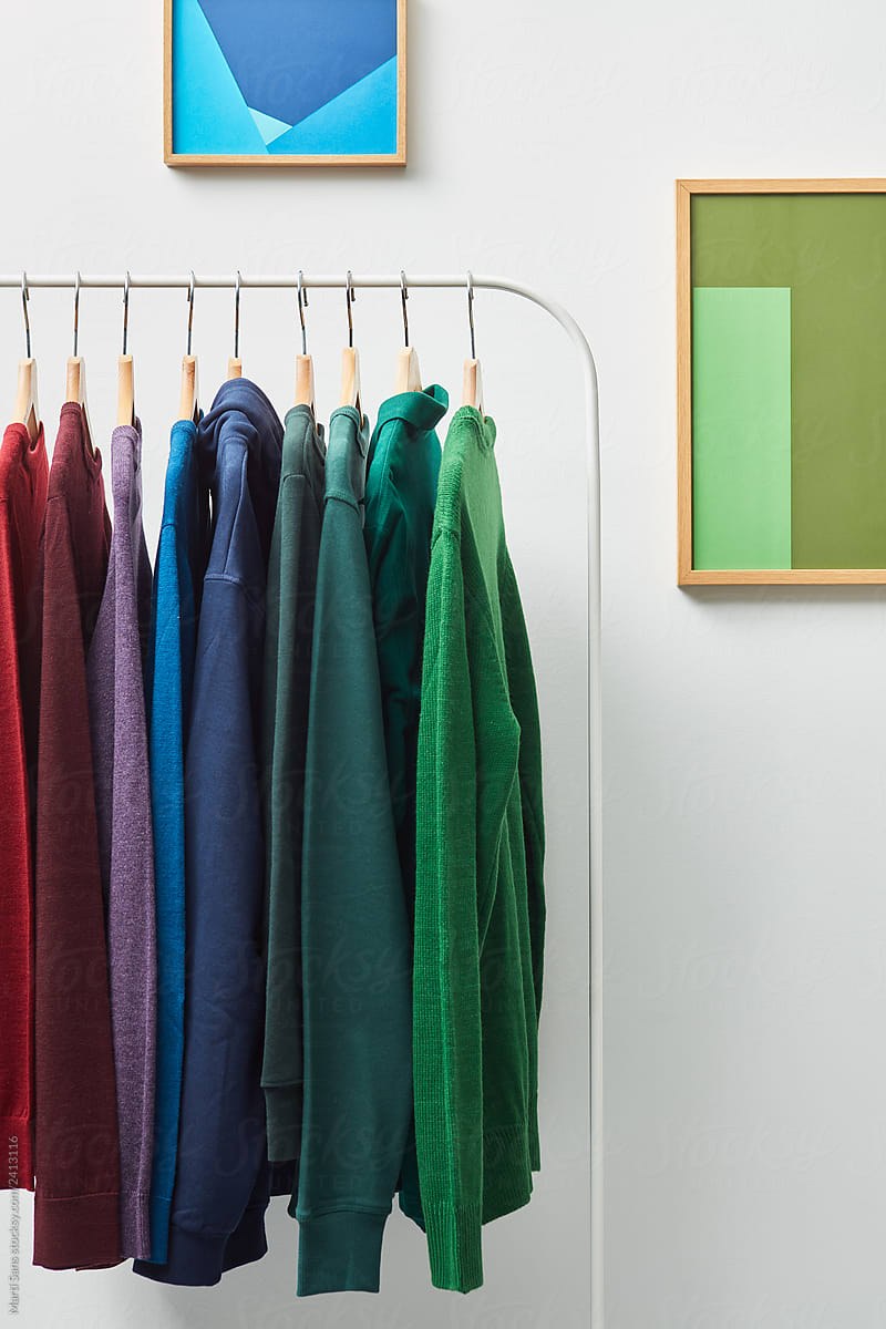 Colorful clothes on metal rack