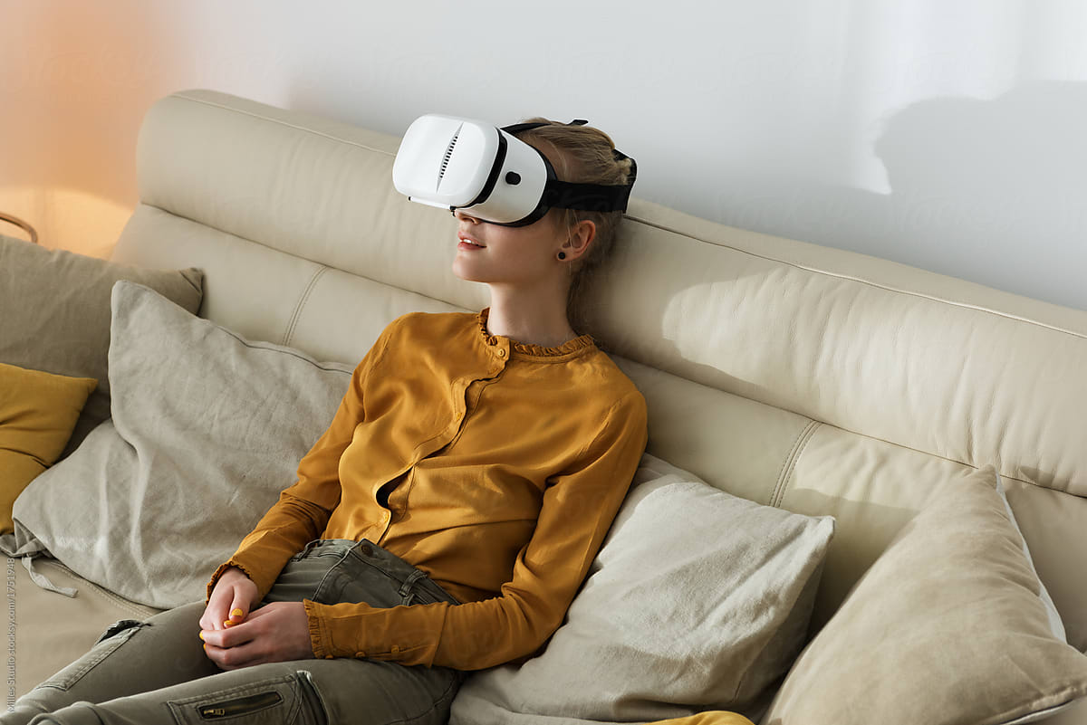 Relaxing woman excited with virtual world