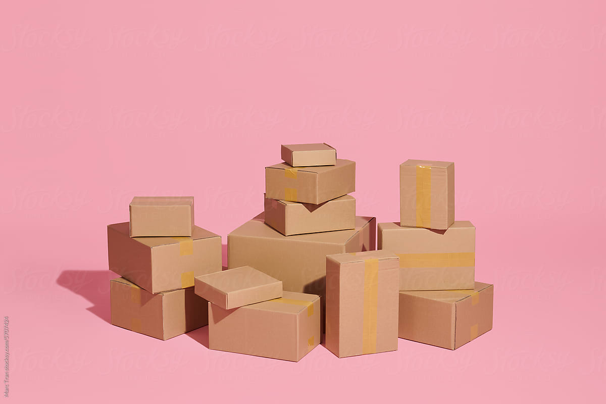 a lot\'s of boxes in one photo and pink background