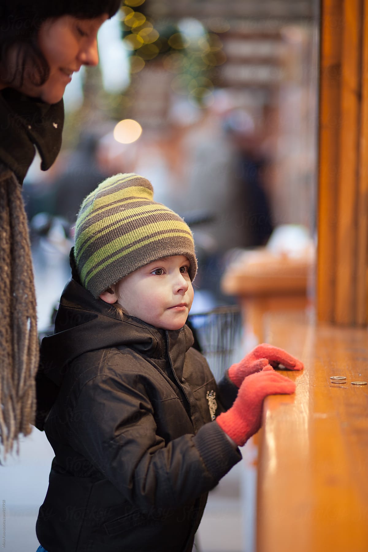 Mother and son on Christmas market