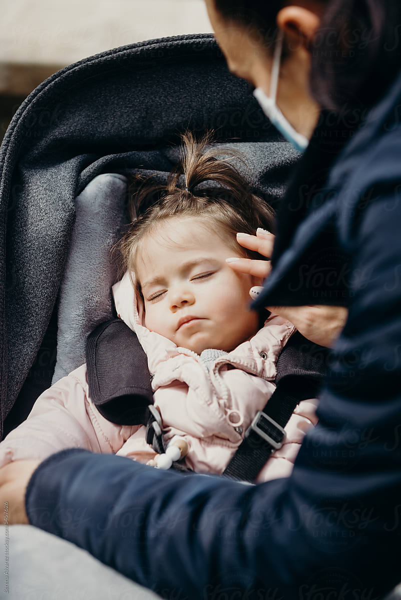 BABY girl Sleeping In Stroller In the  City