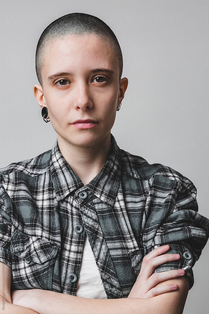 Androgynous Young Woman Posing Tough as a Male