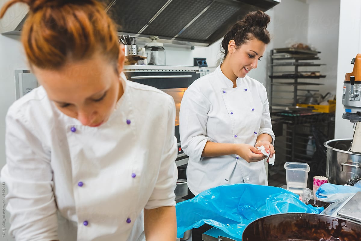 Two Women Pastry Chef Working in a Professional Kitchen