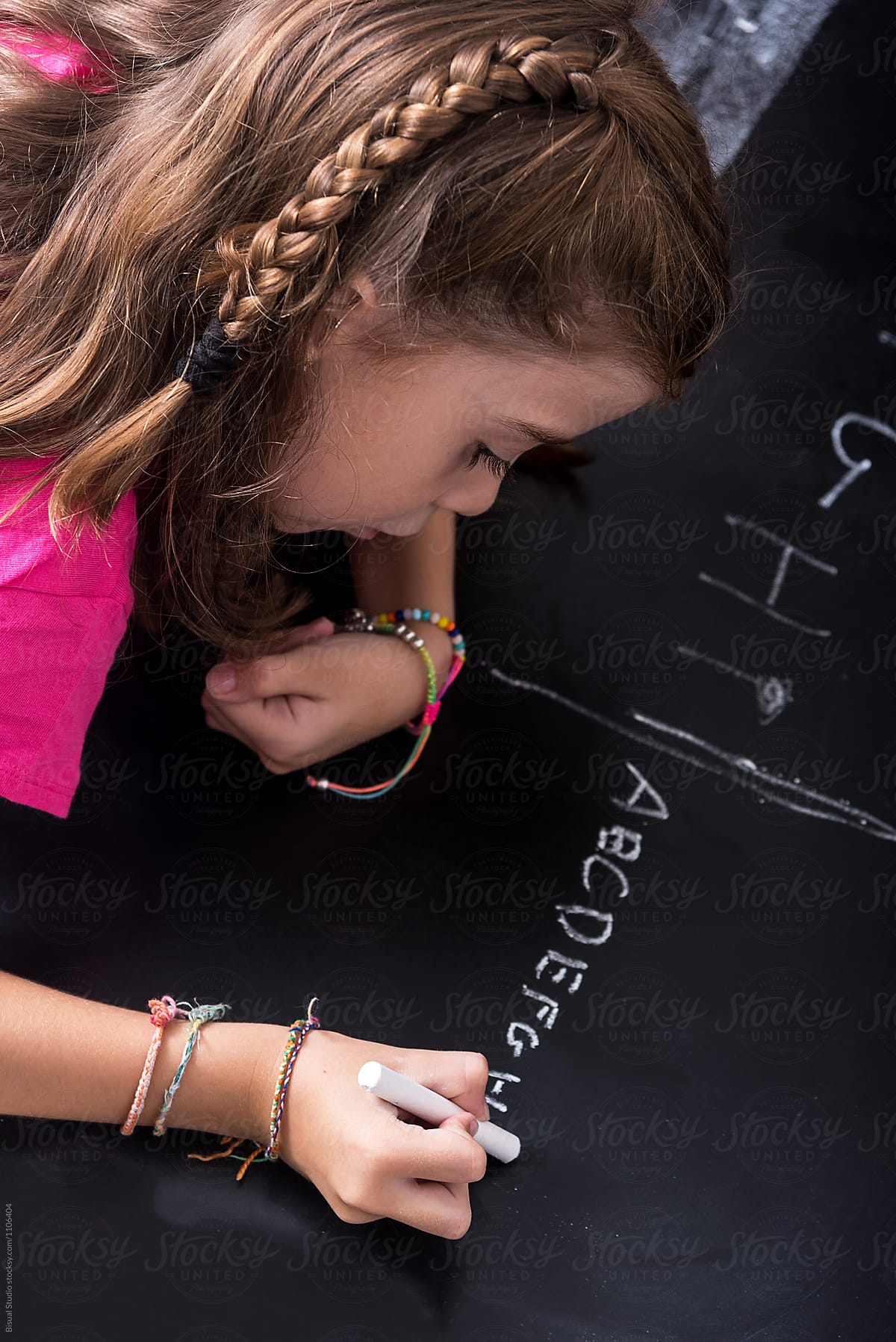 Girl Drawing On Chalkboard By Stocksy Contributor Bisual Studio Stocksy