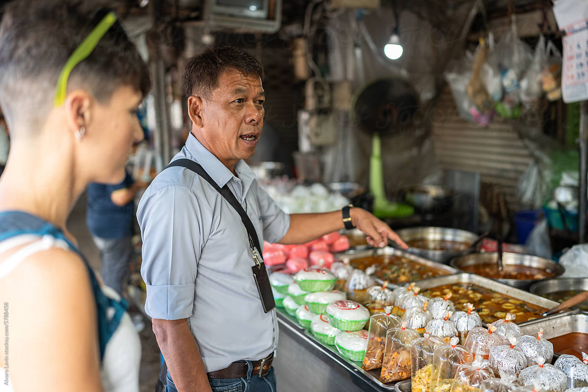 Tourist guide at a market.