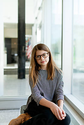 Quietly Confident Preteen Girl Wearing Glasses by Stocksy Contributor  Amanda Worrall - Stocksy