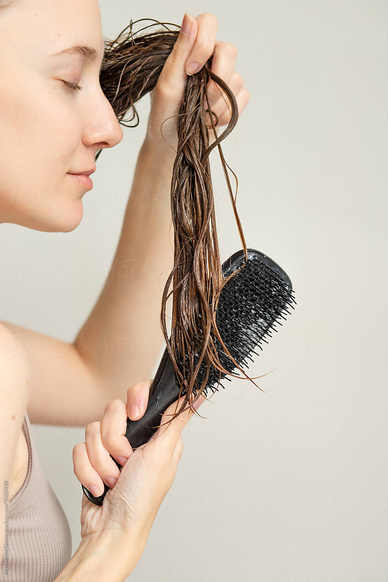 Combing wet hair beauty care routine