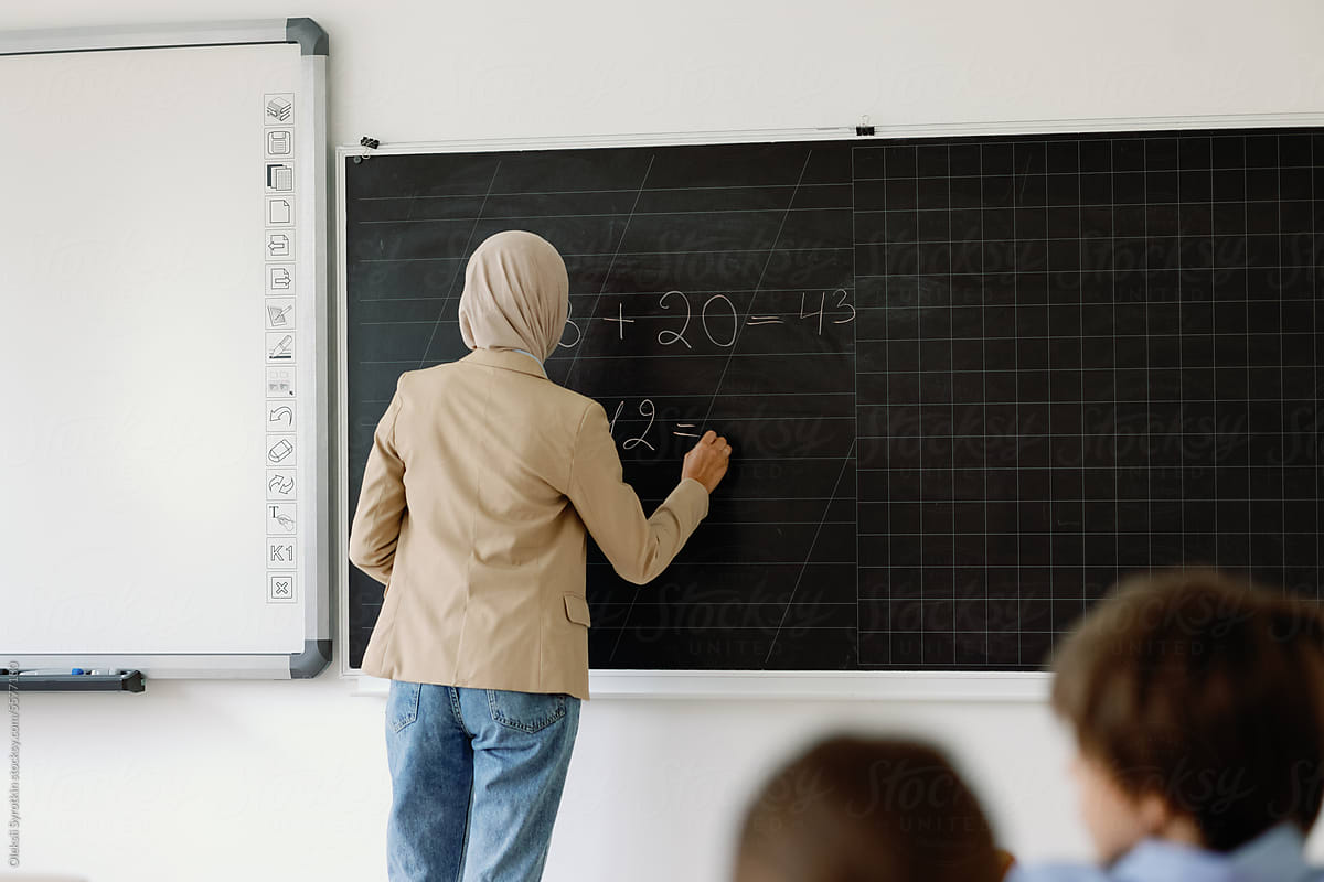 Lyceum head teacher writing blackboard exercise