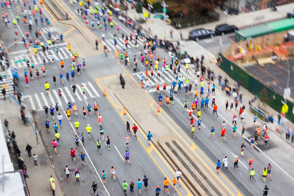 City marathon runners from above