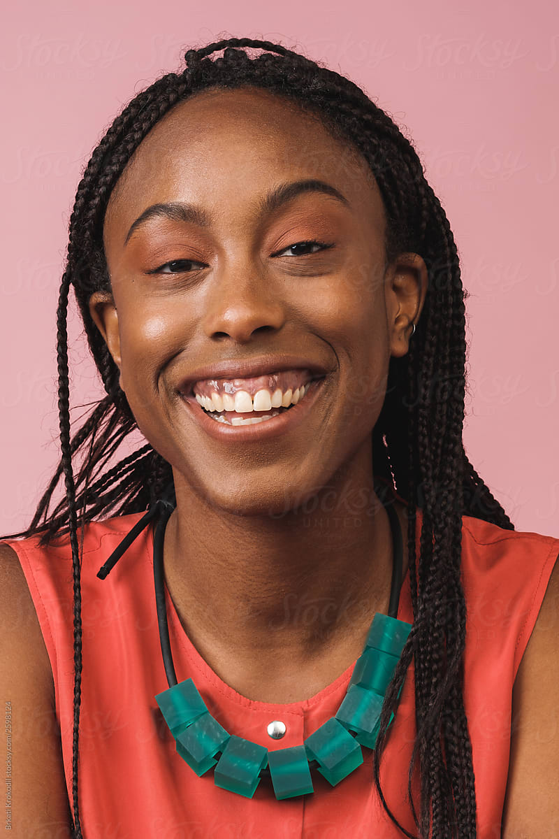 Black Smiling Woman Studio Portrait