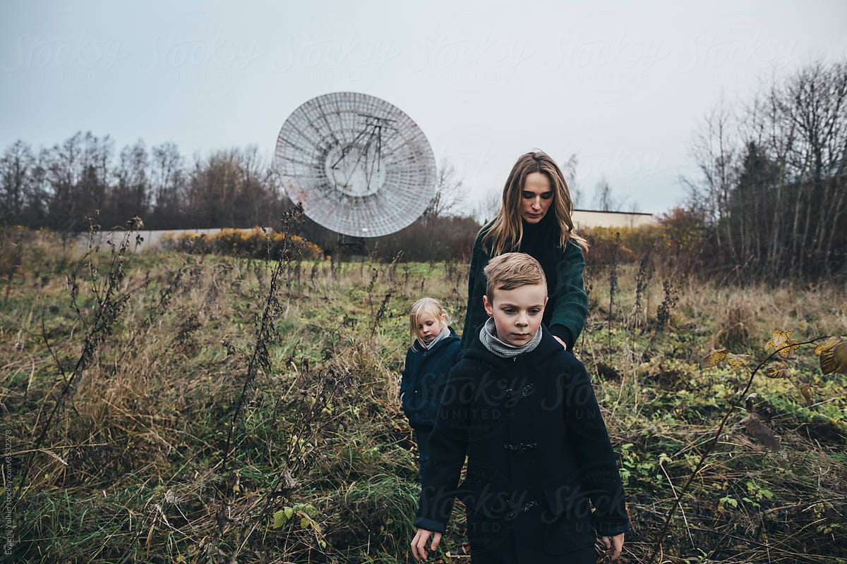 Woman and children at the satellite dish