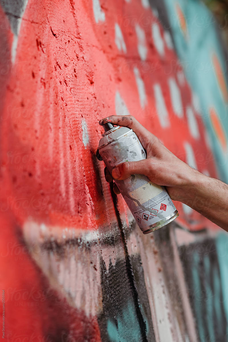 Graffiti artist painting