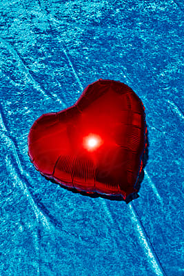 Deflated Heart-shapped Balloon by Stocksy Contributor Juan Moyano -  Stocksy