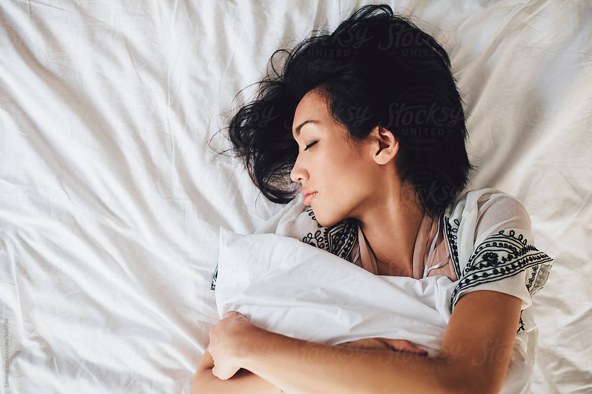 Beautiful Woman Sleeping In Bed By Stocksy Contributor Lumina Stocksy