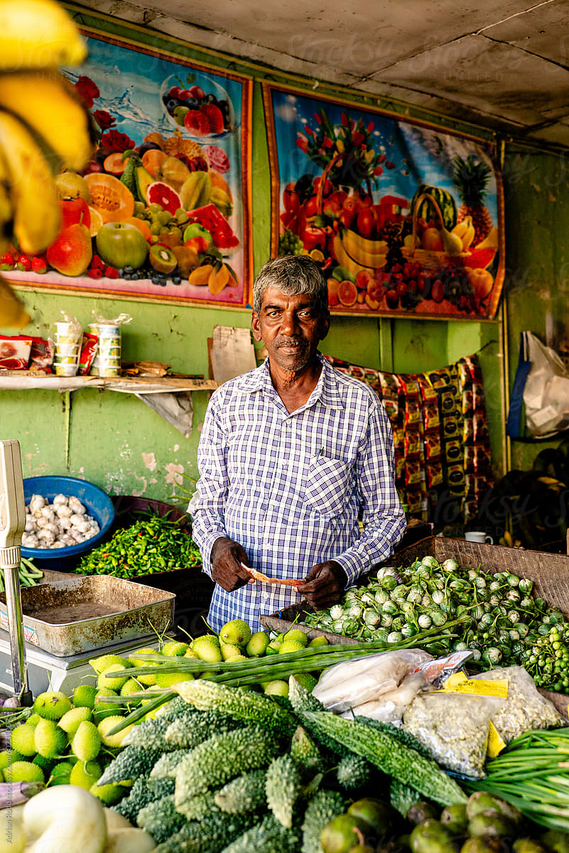 Man selling fruit and vegetables in Sri Lanka