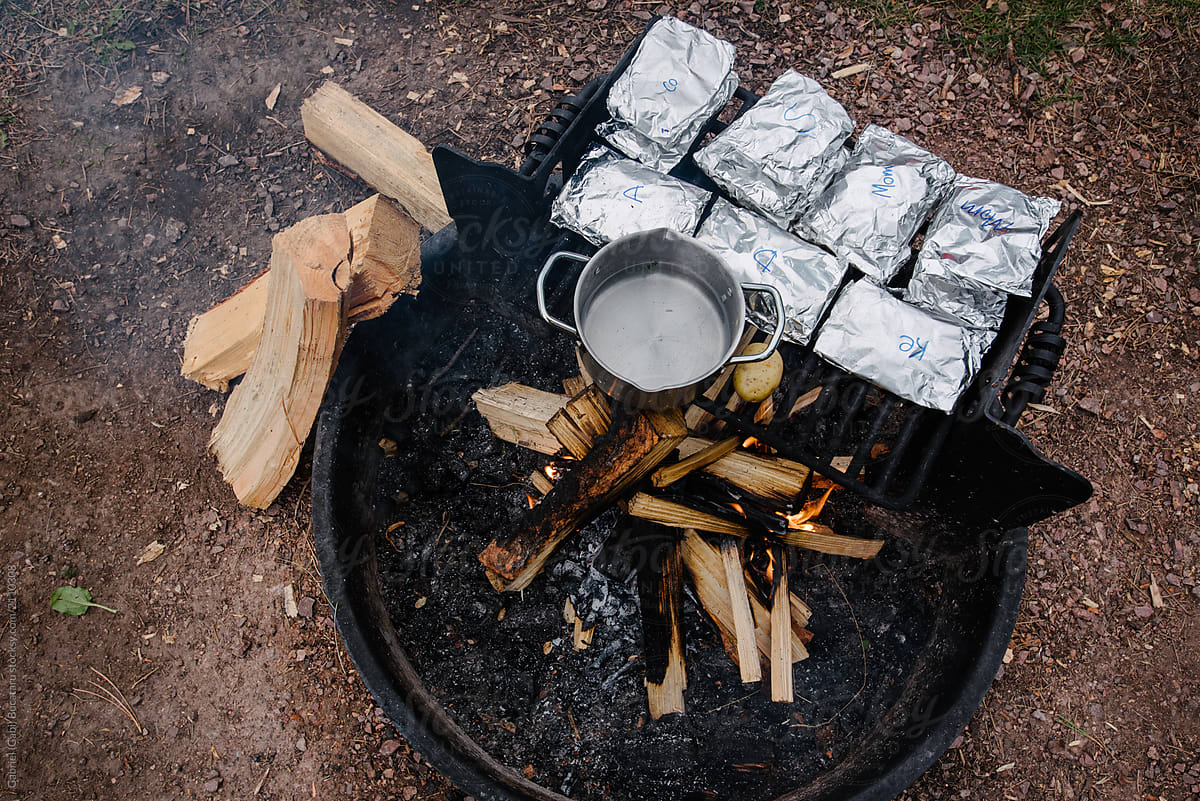Pouches Cooking Over a Campfire