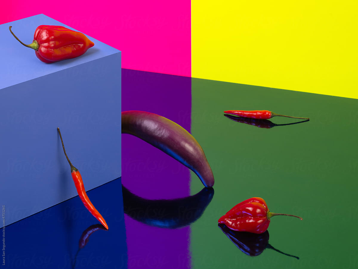 Colorful still life with chili peppers and Chinese aubergine