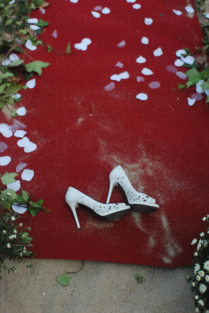 Bridal Heels on Red Carpet With Petal Scatter