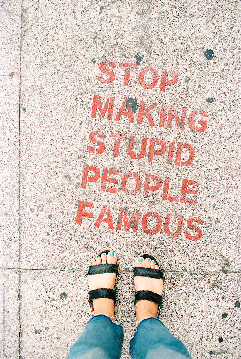 Stop Making Stupid People Famous Sign on the streets of CA