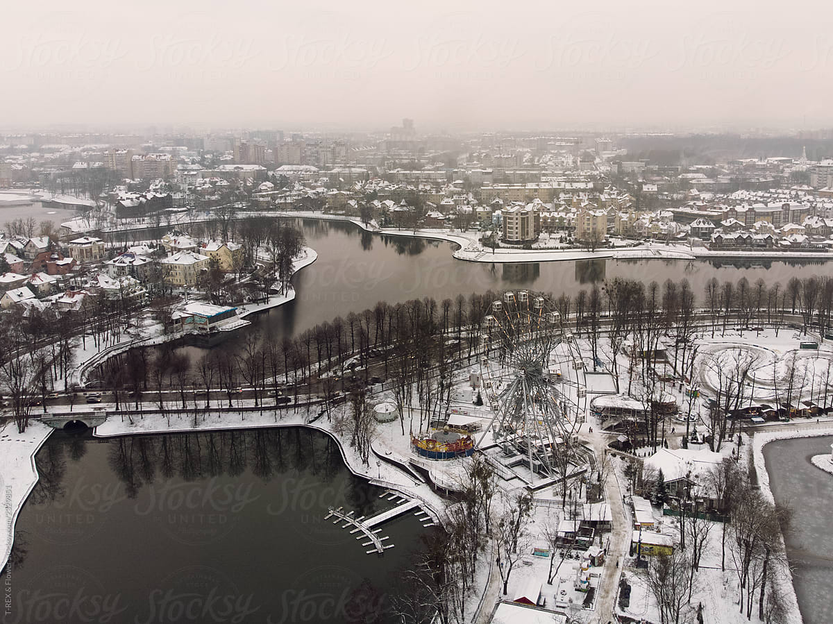 Picturesque view of river between winter city
