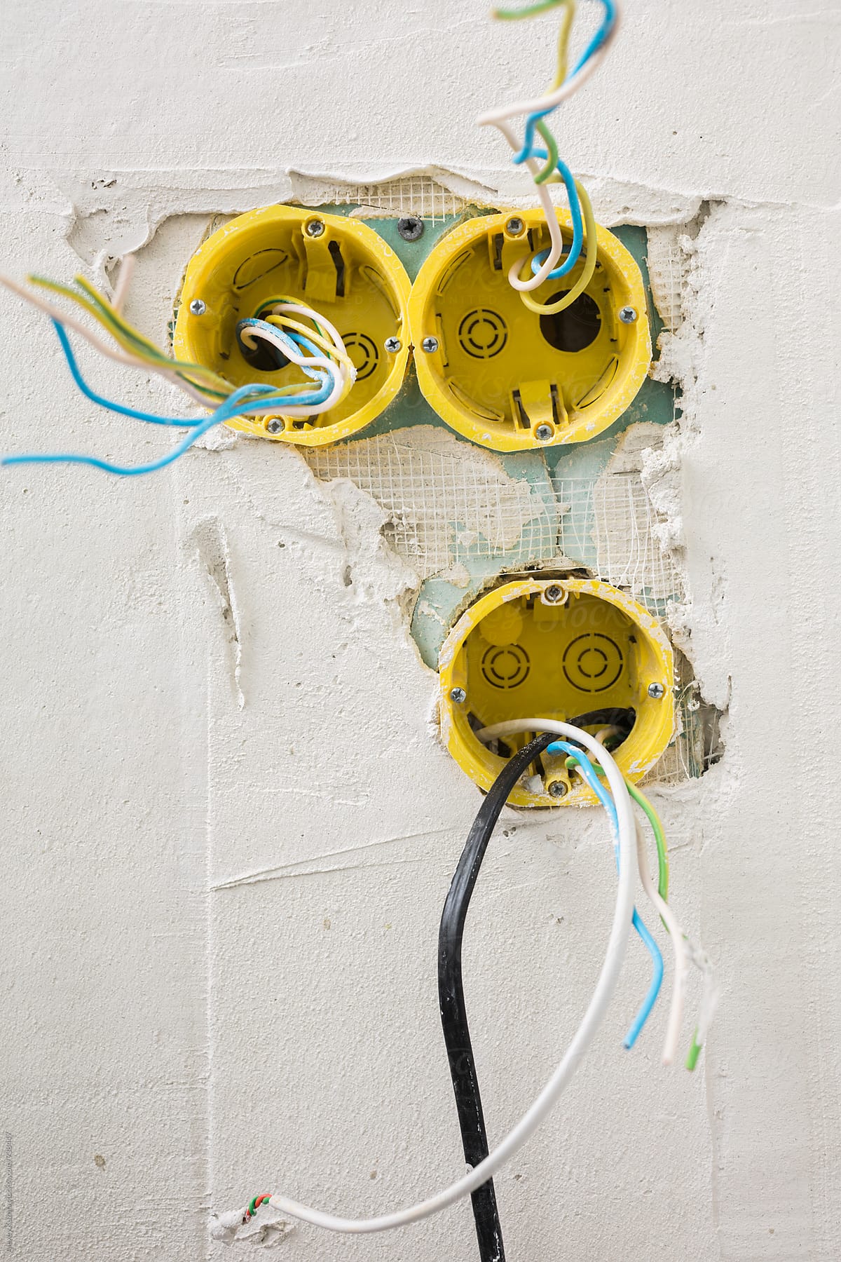 yellow power socket under construction