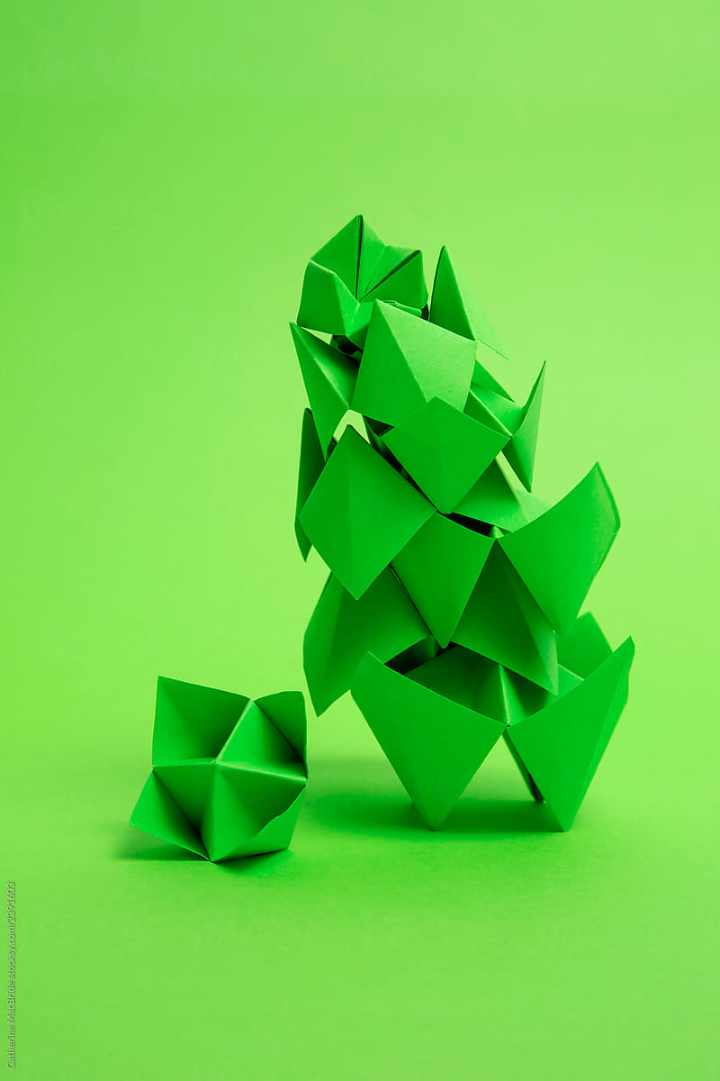 Green fortune tellers on green background