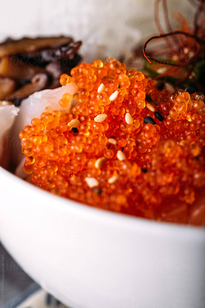 Dish with tobiko caviar in bowl