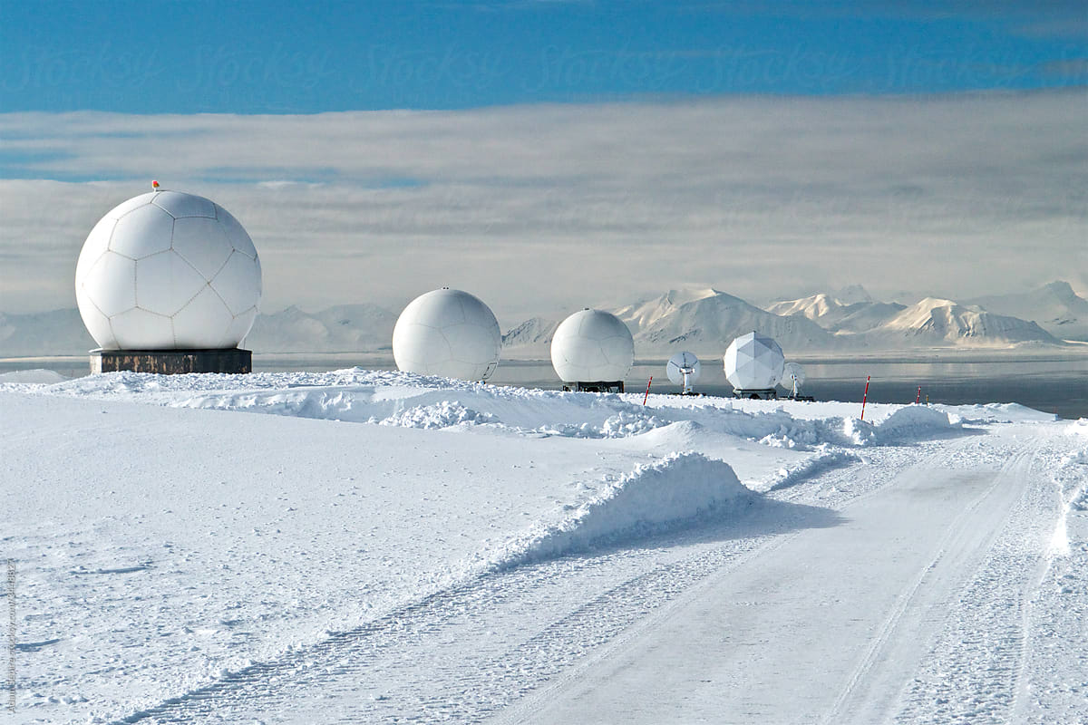 Svalbard satellite base station and Arctic mountain range